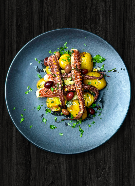 octopus on a plate with potatoes
